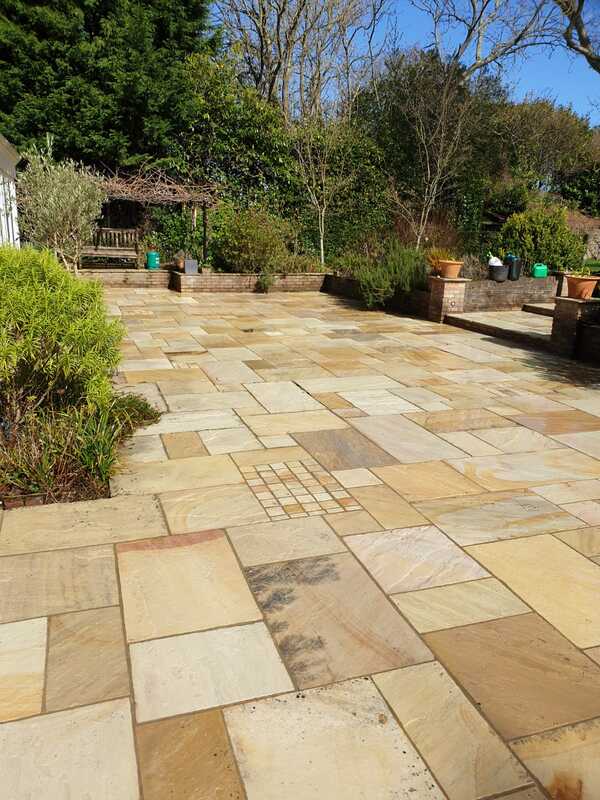 Sandstone paving slab patio, after power washing